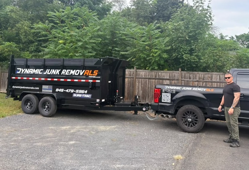 Dynamic Junk Removals truck and trailer on a job